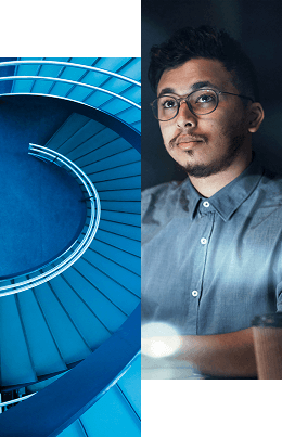 Split image: On the left, a top-down view of a modern blue spiral staircase; on the right, a man with glasses and a trimmed beard, in a blue shirt, looks thoughtfully—learn more about how we help organizations' directory infrastructure enhancement.