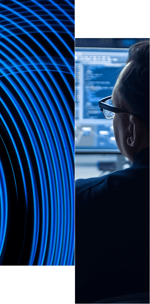 A split image showing blue circular light patterns on the left and a person with glasses looking at computer screens with code on the right, highlighting Identity Solutions by Industry in action.