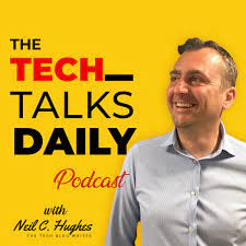 A man in a light blue shirt smiles against a bright yellow background featuring the text: The Tech Talks Daily Podcast with Neil C. Hughes, The Tech Blog Writer.