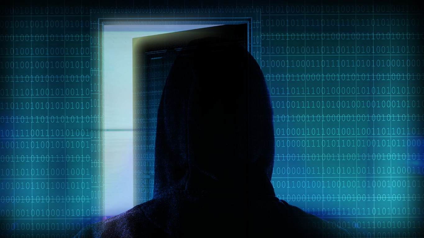 A person wearing a dark hoodie stands facing an open door with digital binary code overlaying the image, suggesting themes of hacking or cybersecurity.