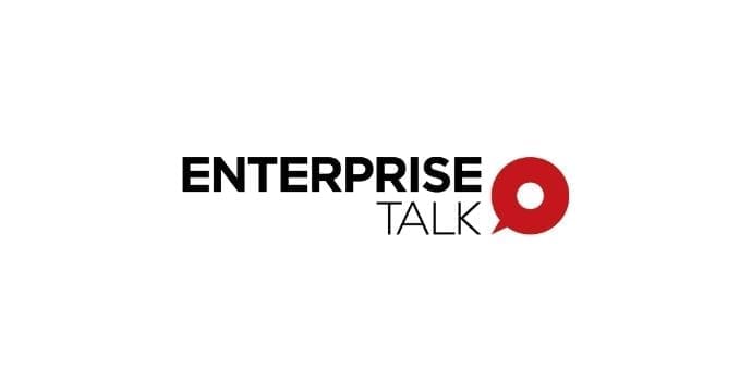 The image features the text ENTERPRISE TALK with ENTERPRISE in bold black font and TALK in thin black font. A red speech bubble with a white center replaces the letter O in TALK.